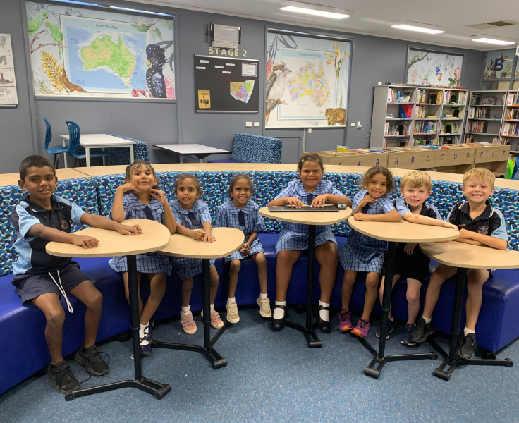 photo of a group of students in the library