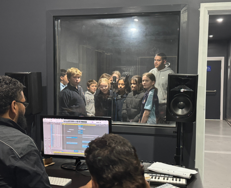 photo of students in the recording studio at the Yellow Belly Studio