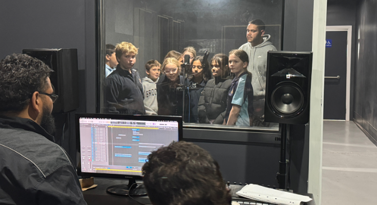 photo of students in the recording studio at the Yellow Belly Studio